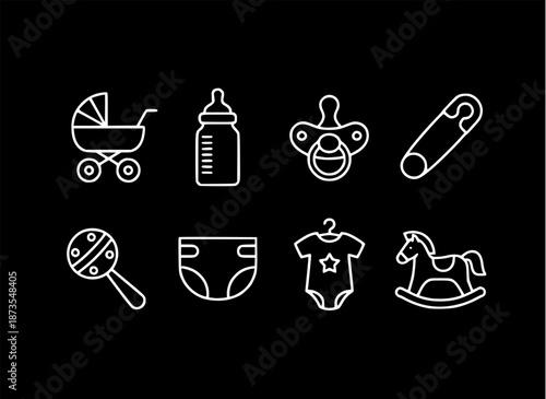 Baby items and toys arranged neatly on a black background