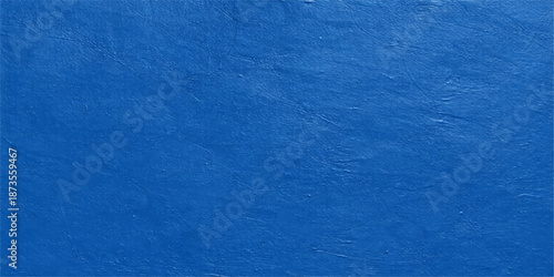 Blue grunge textured wall background