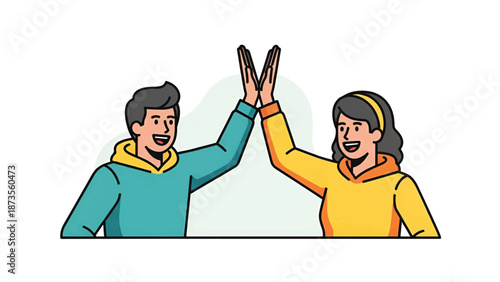 Two smiling young people in colorful hoodies give each other an enthusiastic high-five and teamwork!