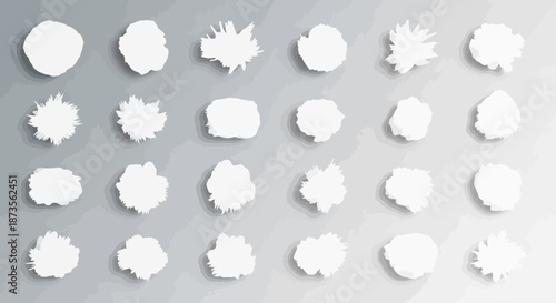 Collection of white abstract shapes on a grey gradient background.