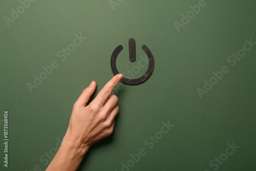 Female hand with power butt...