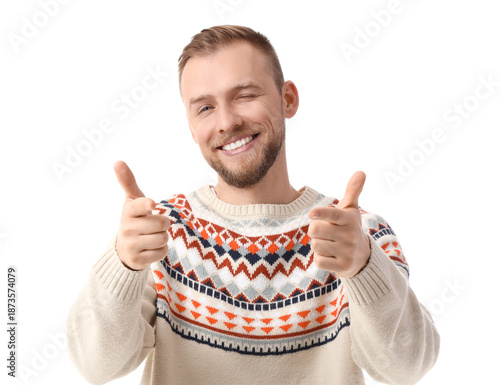 Young man in winter sweater...