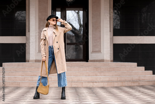 Stylish young woman wearing...