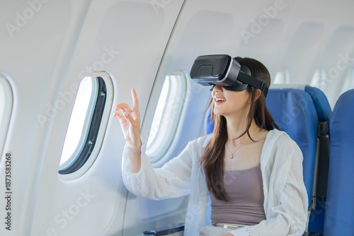 A young woman wearing virtual reality glasses is enjoying realistic futuristic technology, game simulations, digital innovation, and exploring the cyber world with an interactive headset experience.