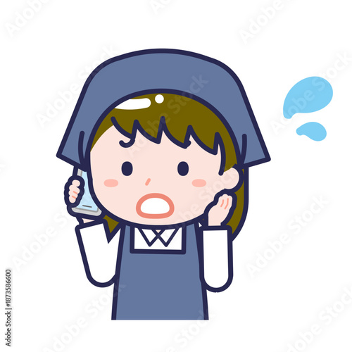 スマートフォンを使う「スタッフ」の女性