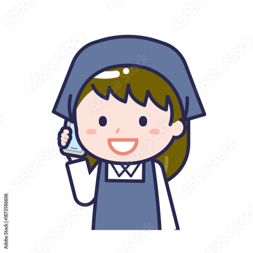 スマートフォンを使う「スタッフ」の女性