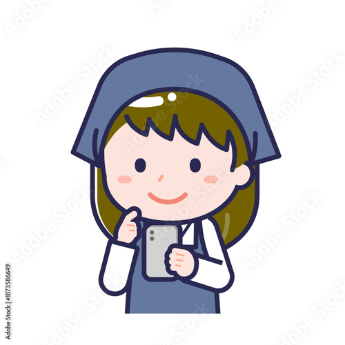 スマートフォンを使う「スタッフ」の女性