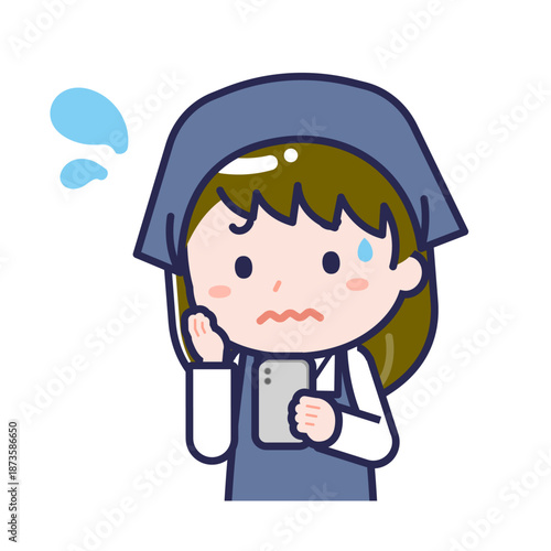 スマートフォンを使う「スタッフ」の女性