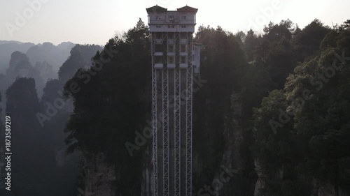 Stunning 4K UHD aerial and time-lapse footage of Zhangjiajie’s Wulingyuan Scenic Area, a world-famous tourist attraction renowned for its dramatic quartz sandstone peaks.
