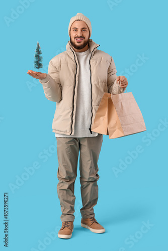 Young man in winter clothes...