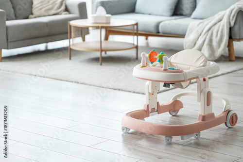 Baby walker on floor in liv...