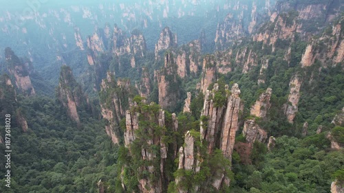 Stunning 4K UHD aerial and time-lapse footage of Zhangjiajie’s Wulingyuan Scenic Area, a world-famous tourist attraction renowned for its dramatic quartz sandstone peaks.