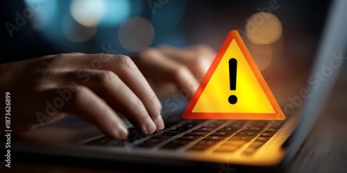Hands Typing on Laptop with Attention Grabbing Warning Sign in Background Indicating Urgency and Caution for Digital Safety Awareness