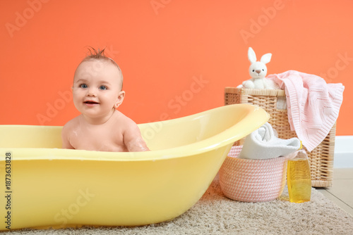 Cute little baby in bathtub...