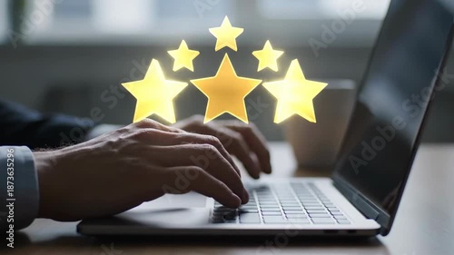 Customer satisfaction rating with five stars on laptop screen.