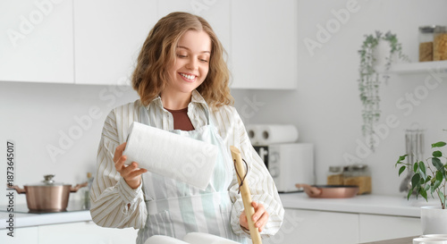 Young woman with rolls of p...