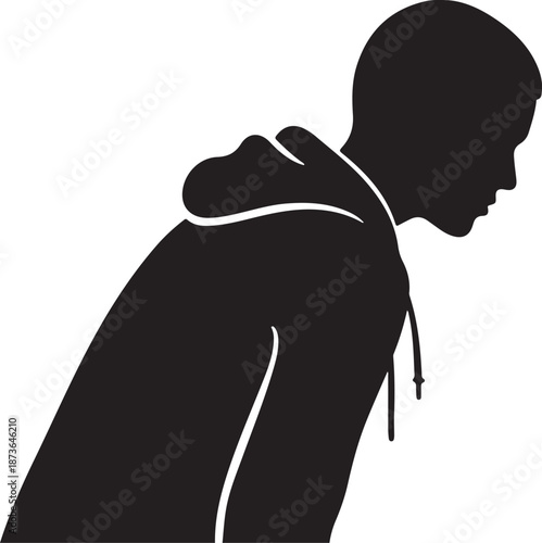 Silhouette of a man wearing a hoodie looking down