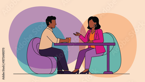 Professional discussion between two diverse individuals fostering communication and shared