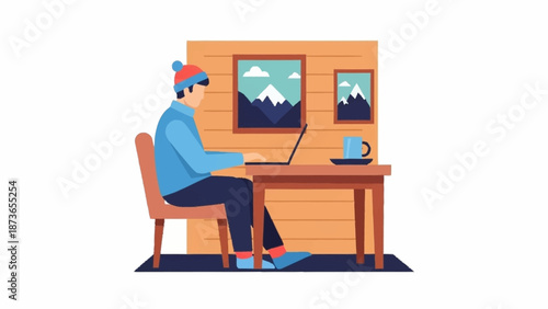 A person in winter attire focused on a laptop at a cozy wooden desk with mountain artwork.