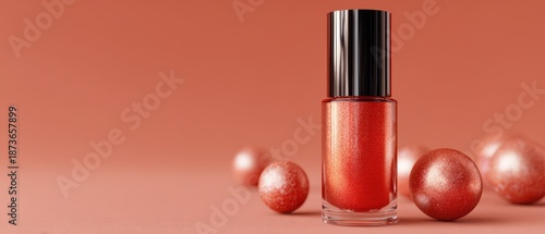 Elegant cosmetic item in red orange glitter finish paired with decorative spheres on minimal coral surface for fashion, beauty lifestyle and luxury product advertising concept photography
