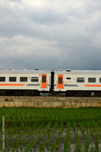 Passenger train traveling on railway tracks