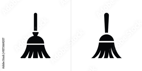 Two Black Broom Icons on White Background Cleaning Tool Simple Silhouette