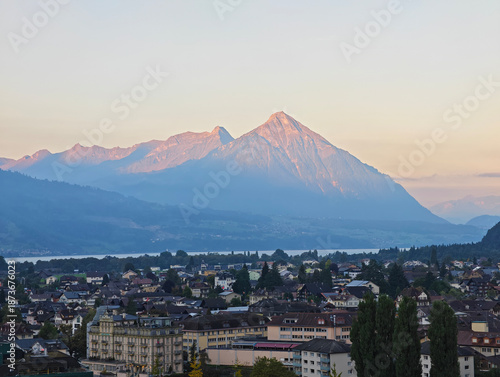 Aerial view of Interlaken town and Mount Niesen at dawn in Switzerland