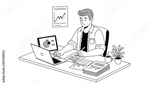 Man Working on Laptop at Desk.