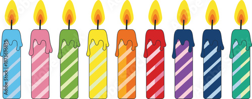 Colorful birthday candles with flames