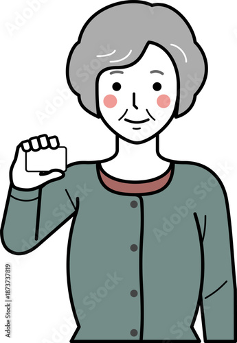 正面向き。カードを持つカーディガンを着た高齢女性。