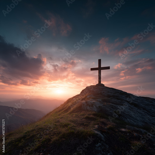Centered Christian cross silhouette on the mountain at sunrise