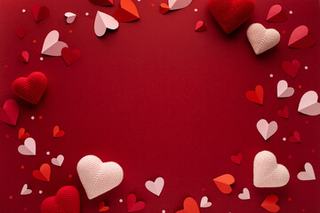 Valentine day blank background with red and pink hearts top view. Festive mockup or template for love design and holiday promotion.