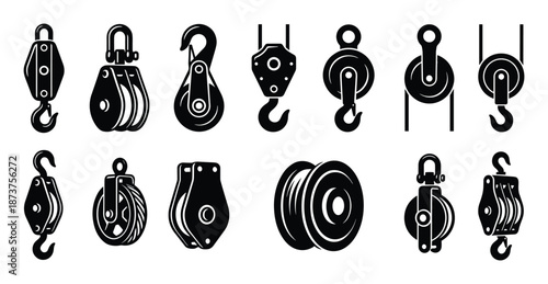 Set of various black and white pulleys, construction equipment, industrial lifting device, mechanical hoists and tackle blocks