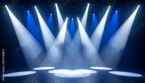 Dramatic stage lighting illuminating a darkened performance space