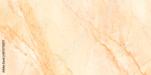 An abstract view of a warm toned marble surface showing delicate veining and natural stone patterns