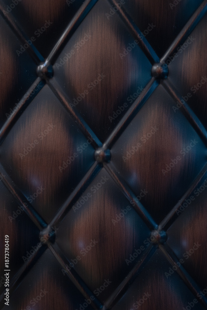Fototapeta premium Luxury dark brown quilted leather texture with diamond pattern and buttons. Classic tufted upholstery background for furniture design