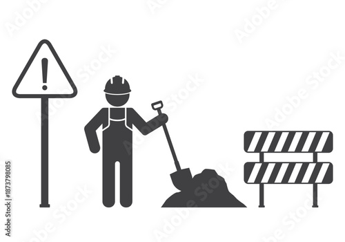 worker on road work near warning sign icon