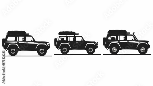 Three Black Off Road Vehicles Lined Up Side By Side.