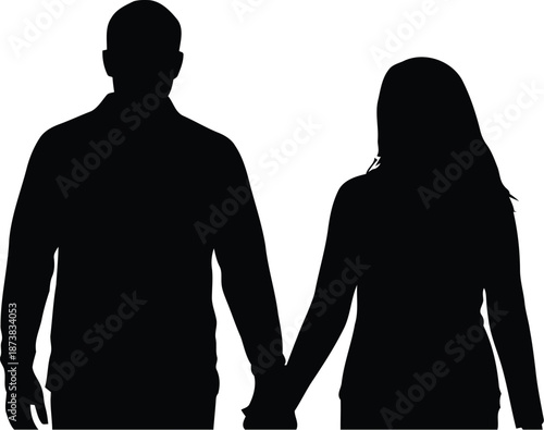 A loving couple stands together hand in hand under a glowing heart