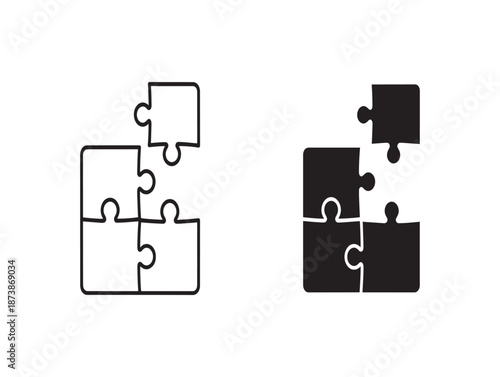Jigsaw puzzle pieces fitting together in contrasting black and white