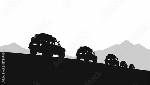 Off road vehicles driving in a line on a mountain landscape silhouette.
