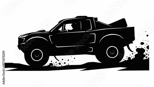 Off road racing truck silhouette kicking up dust.