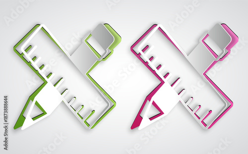 Paper cut Crossed ruler and pencil icon isolated on grey background. Straightedge symbol. Drawing and educational tools. Paper art style. Vector