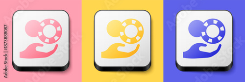 Isometric Hand holding casino chips icon isolated on pink, yellow and blue background. Casino gambling. Square button. Vector