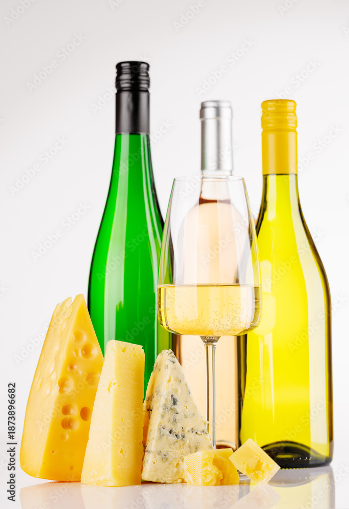 Obraz premium Assorted cheeses and wine on white background