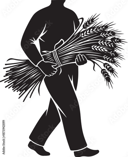 Man carrying a bundle of wheat in his hands