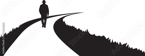 Man walking on road with two paths ahead silhouette