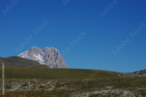 The summit of Monte Corno rises toward the clear sky
- Gran Sasso, L'Aquila, Abruzzo, Italy