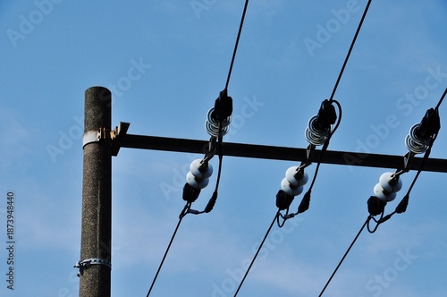Electric Power Lines and Insulators on Utility Pole at Kashimada Station, Kanagawa, Japan