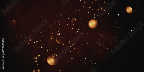 Golden abstract bokeh on black background. Holiday concept.